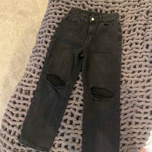 wide legged black ripped jeans